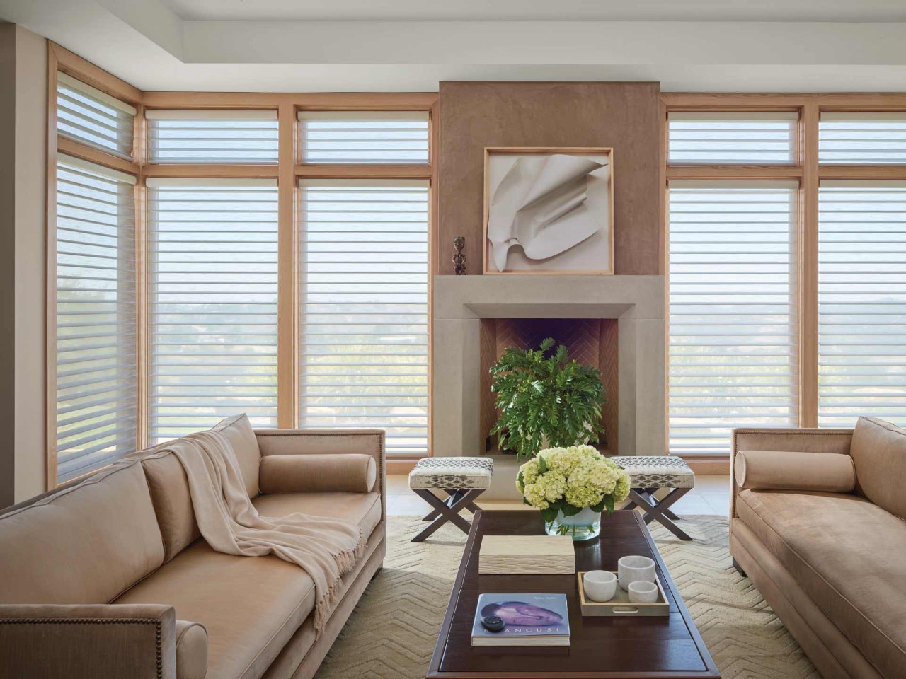 Hunter Douglas window treatments equipped with PowerView® Automation in a family home