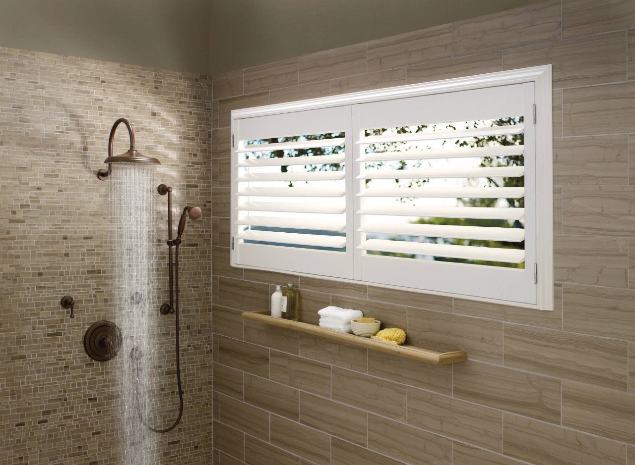 Hunter Douglas Palm Beach™ Polysatin™ Vinyl Shutters in a bathroom near Bellevue, Washington (WA)