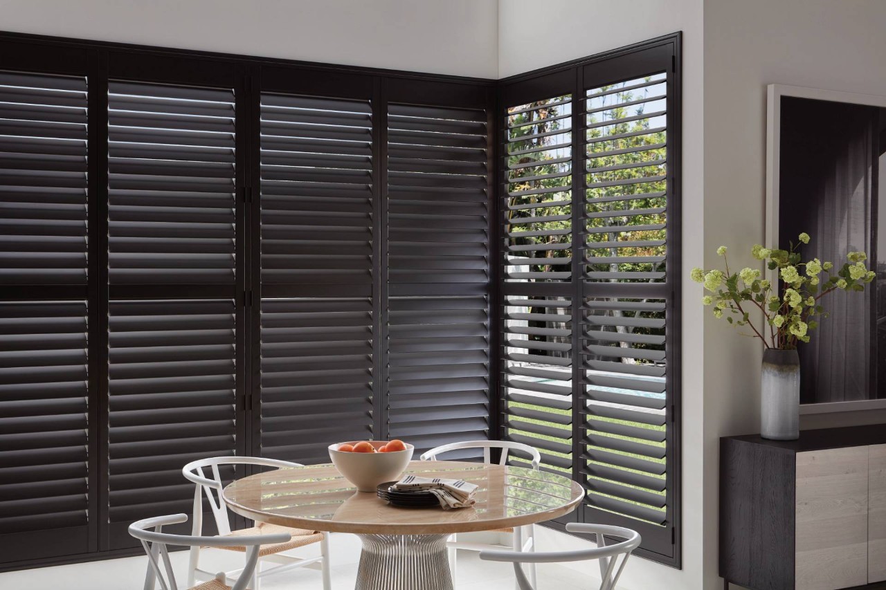  Hunter Douglas Heritance® Wood Shutters in a dining room near Bellevue, Washington (WA)